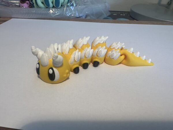 Thorn CaterBot HQ – žlutá pohyblivá figurka s bílými ostny